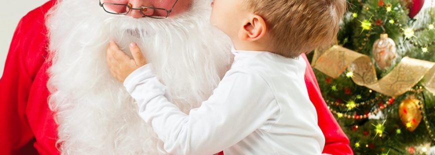 Santa Claus and Little Boy. Christmas Scene