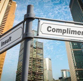 Street Sign Compliment versus Insult